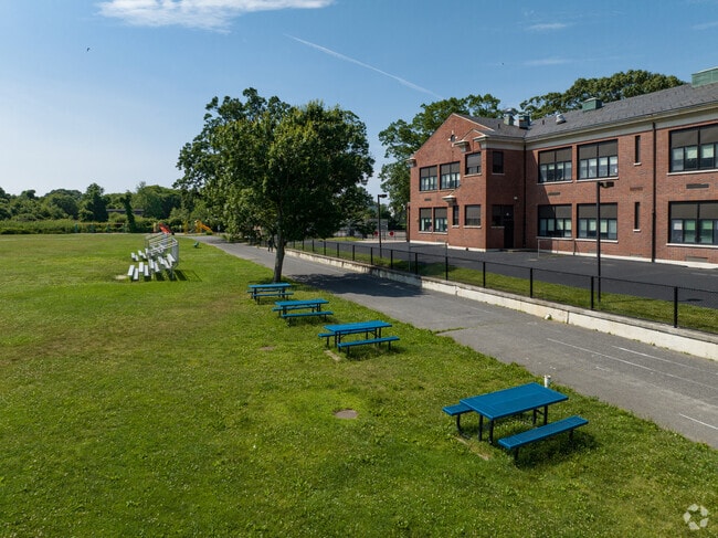 Take a break from the track and rest at one of the picnic tables beside it.