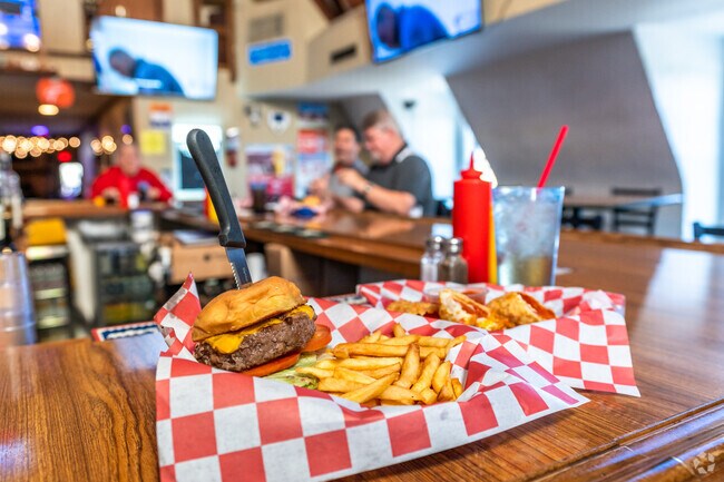 Grab a delicious burger and appetizer at Tugboat's Pub in the Plain Township neighborhood.