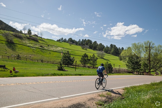 Cyclists enjoy the scenic beauty of Indian Hills.
