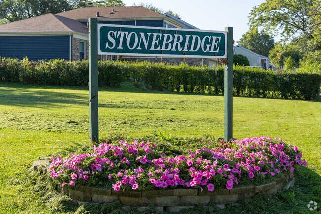 When driving into Stonebridge you'll see a welcoming sign surrounded by a flower bed.
