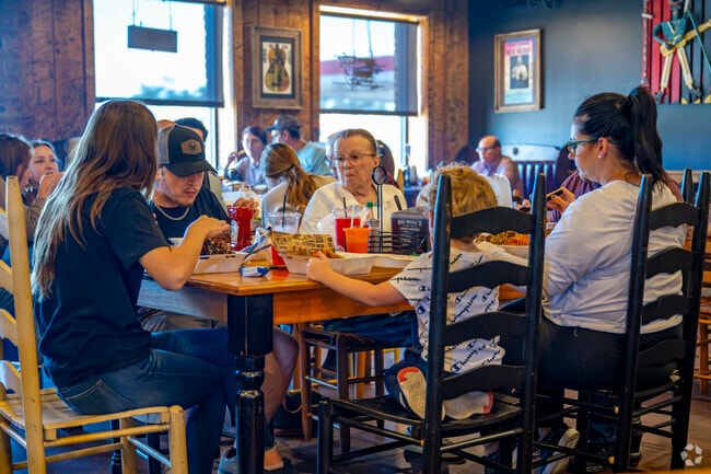 A family takes a leisurely lunch at Big Mikes in Mulberry.