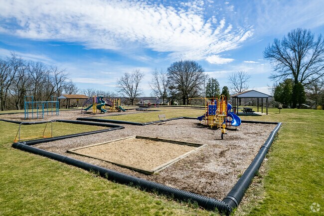 Sand and swings at Gill Hall Community Park