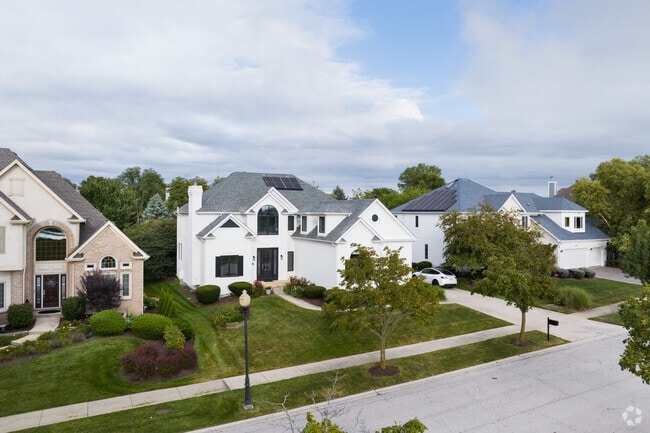 Neighborhoods across Eola Yards boast lush green grass and beautiful blooming flowers.