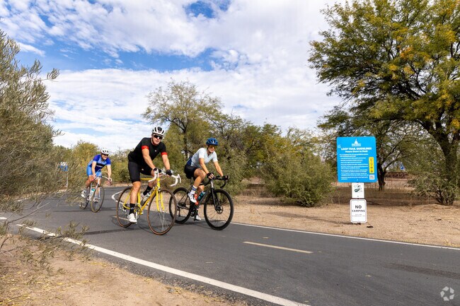 Cyclists love the bike path at the Santa Cruz River Park which is. part of The Loop.
