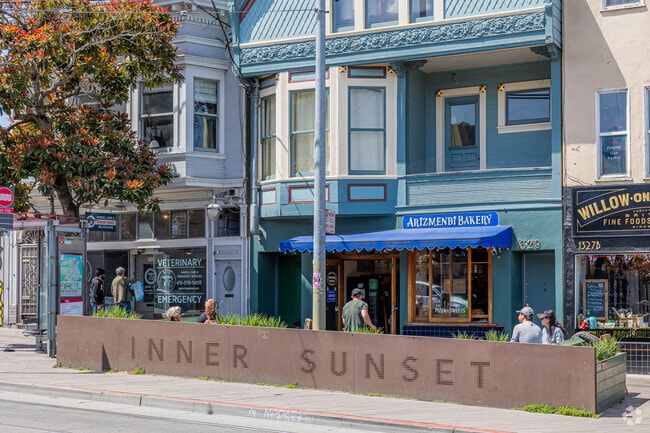 A sign at the 9th Ave Parklet lets people know they are in the Inner Sunset.
