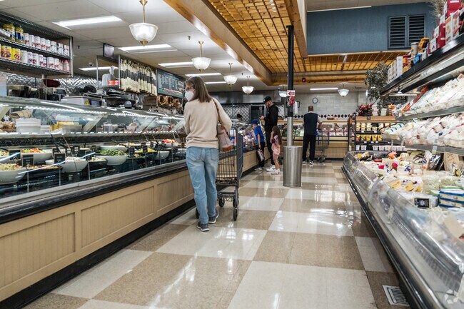 Customers waiting for their hot food at Lunardi's near Portola Highlands.