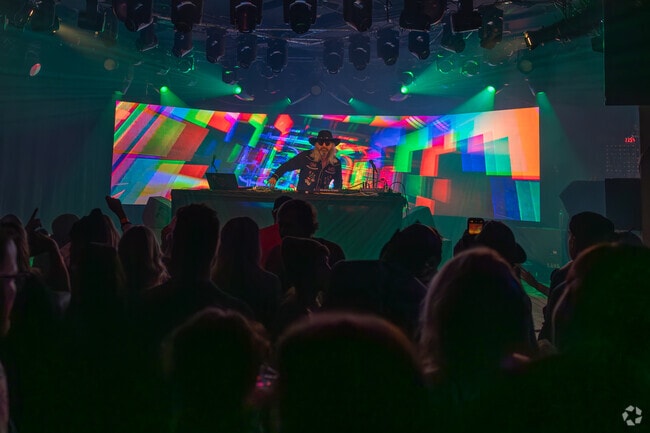 Vibrant lights and beats electrify the crowd at Belly Up in downtown Aspen.