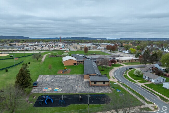 Spence Elementary School has a playground and sport courts on campus.