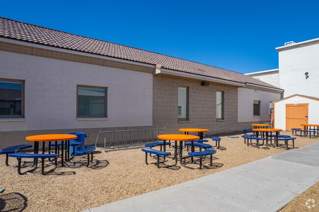 Vibrant Dining: Colorful Tables Create a Lively Atmosphere at Imagine Avondale Elementary.