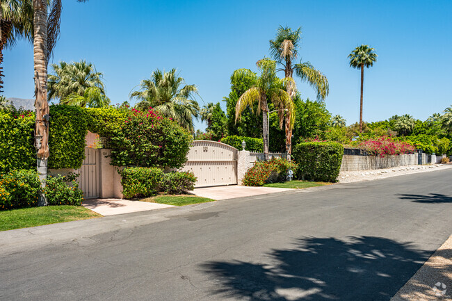 Most homes in The Movie Colony neighborhood remain private behind tall hedges and gates.