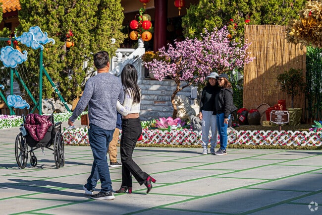 A couple walking through the Hsi Lai Temple in Hacienda Heights