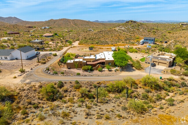 Endless possibilities unfold on these sprawling acres in New River, AZ.