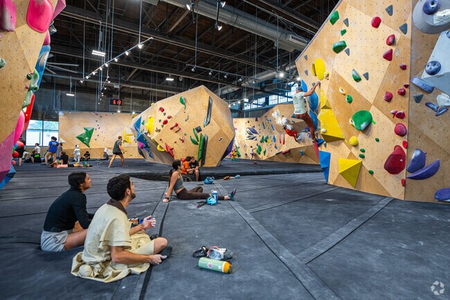 Rock climbing enthusiasts enjoy the challenging walls at North Mass Boulder.
