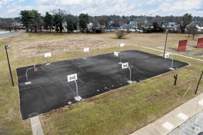 There are basketball courts at J  C  Stuart Elementary School that are used by the neighborhood.