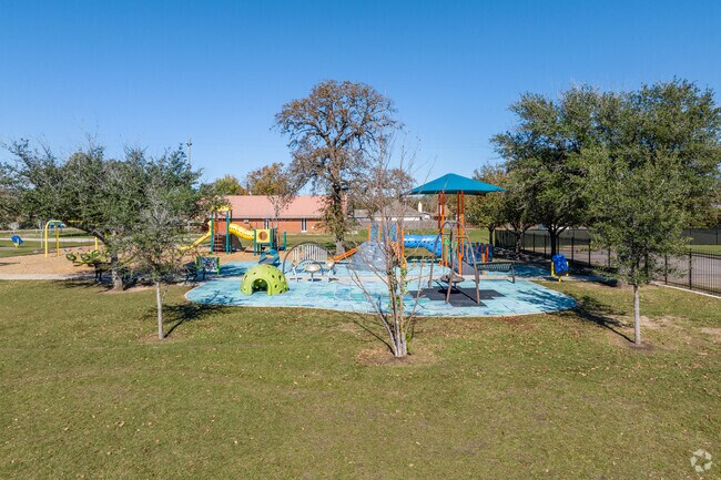 Children can enjoy playground equipment at recess at Travis Elementary.
