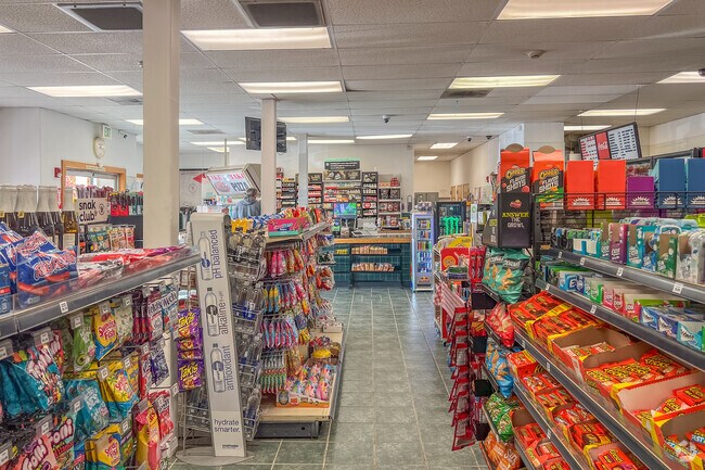 Residents stop by Home Country store famous for their pizza and teriyaki chicken.