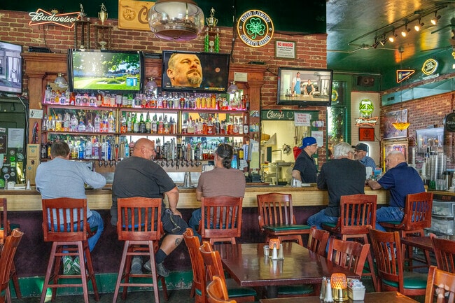 Dine at 100yr. old bar at Clancy's Irish Pub in Historic Old Town Sherwood.