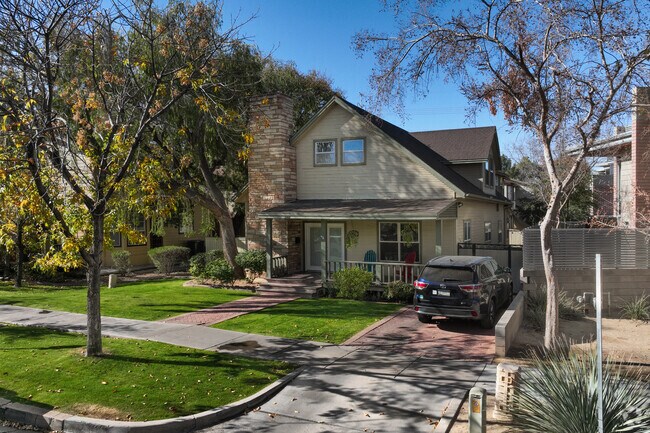 Most homes in Maple Ash are shaded by tall trees.