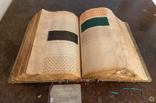 The old swatch book showing what used to be produced in Drayton is on display at the lofts.
