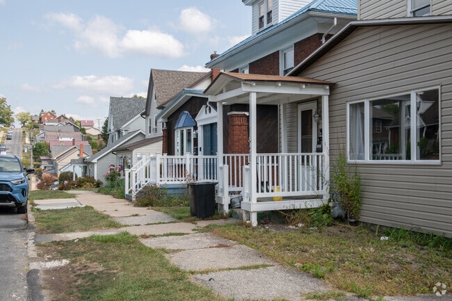 A row of homes in the Newburg neighborhood shows the diversity of construction and style.
