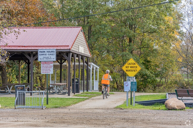 An Almont resident commutes using the bike trails in town.