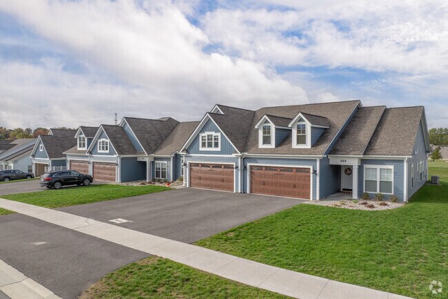 Many homes in Mendon come with attached garages and dormer windows.