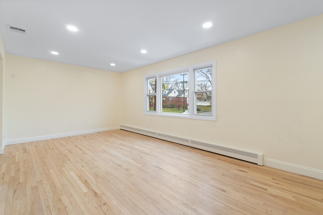 Living room featuring 3 panel window