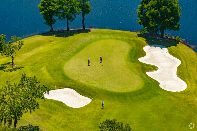 Windermere Country Club residents enjoy golfing at the prestigious Golden Bear Club.