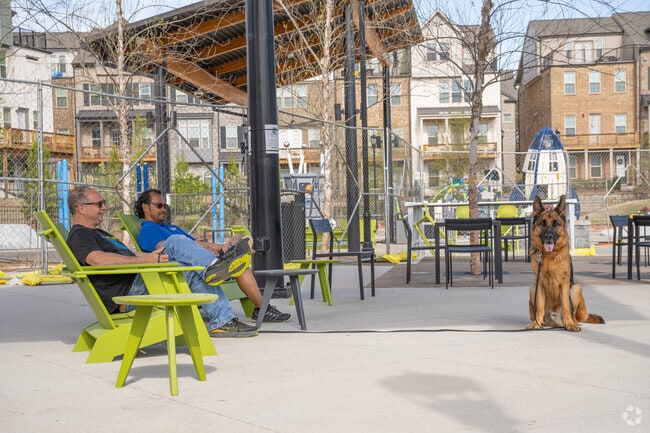 Enjoy the sun at the pet friendly Town Green area of Peachtree Corners.