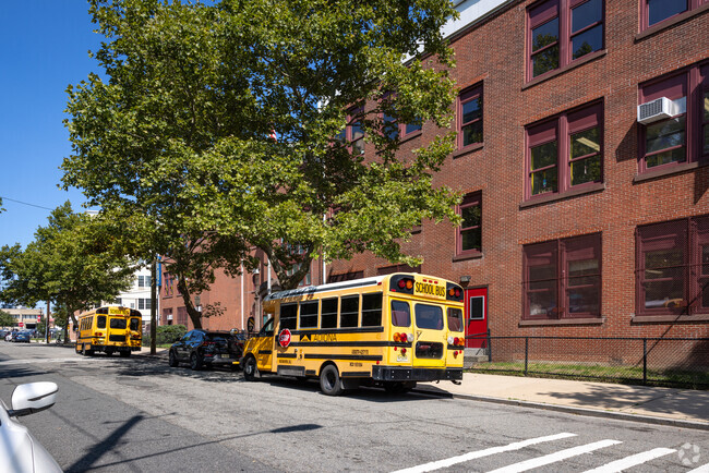 Bookish kids love the learning environment at Sir Isaac Newton Elementary School, Newark, NJ.
