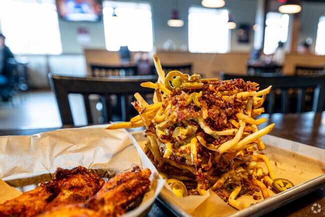 Stop in to Fort Wayne's Shigs In Pit for some delicious BBQ and Tin Can Fries.
