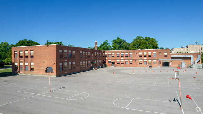 Indian Springs Elementary School features many windows and a red brick exterior.