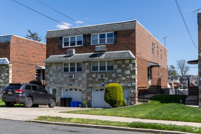 There are two story stone & brick twin homes with attached garages in Torresdale.