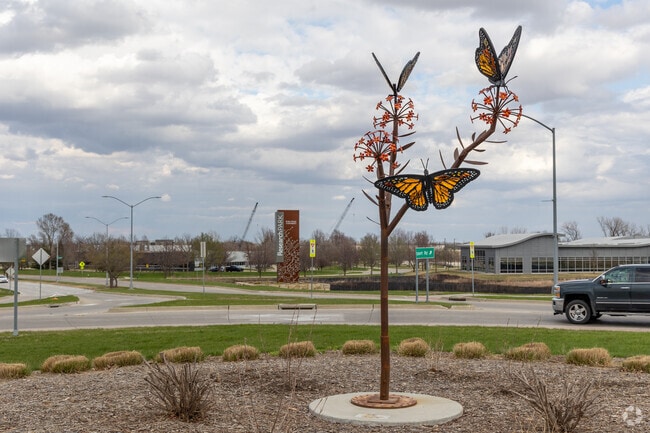 Timberland Road features beautiful sculptures inspired by the nearby Reiman Gardens Butterfly Garden.