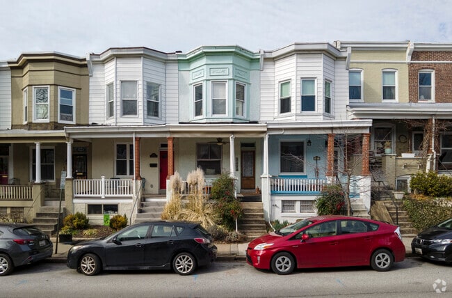 Some row homes in the Wyman Park neighborhood offer small front porches.