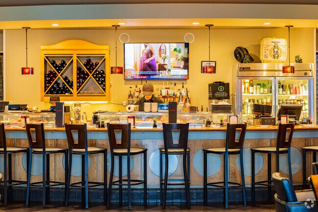 A sushi bar near Twin Oaks features a cool counter for customers.