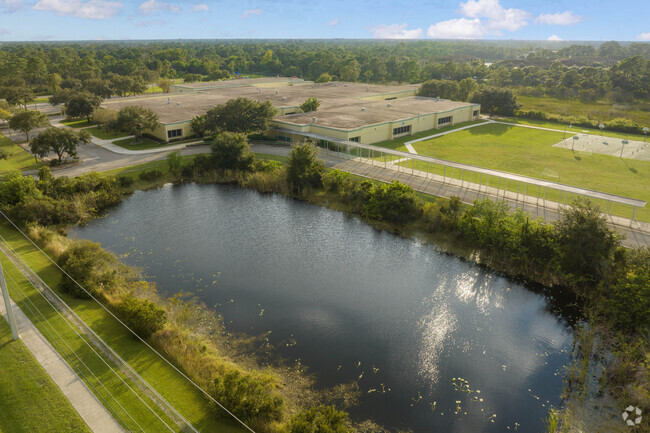 Savanna Ridge elementary school aerial context featuring lake.