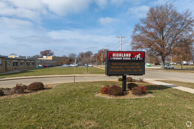 Highland Primary School front entrance sign displays important reminders for parents.