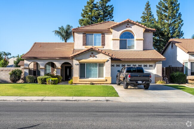 Discover a Spanish-style single-family home in picturesque Eagle Ranch.