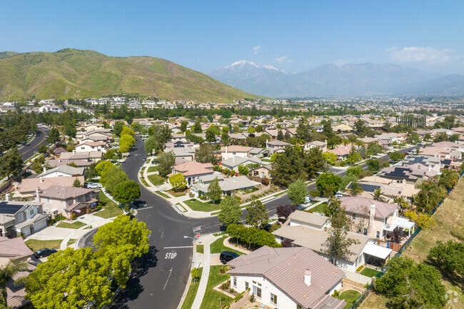 Aerial View a Neighborhood Near Crafton Hills Looking Towards the Snow Capped San Bernardino Mountains Above the Upper Yucaipa/Rolling Hills Area