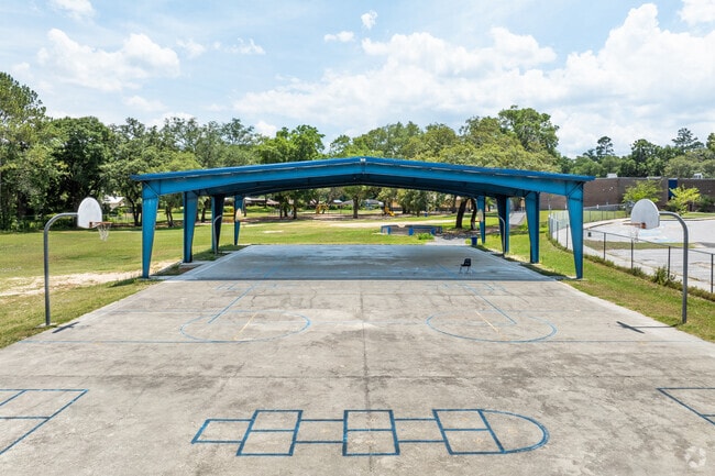 Students can play basketball under the pavilion at Newberry Elementary School.
