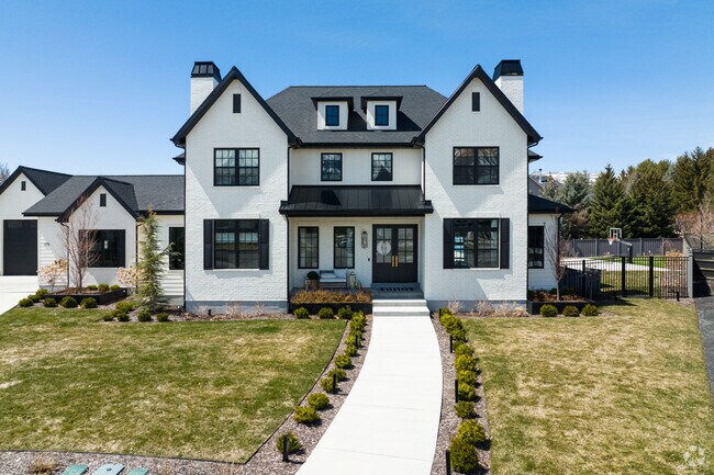 New Alpine homes feature large yards and basketball courts.