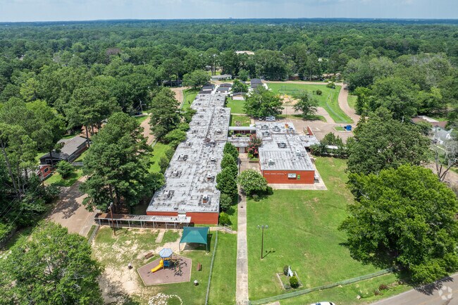 Green Elementary School has a student to teacher ratio of 13 to 1.