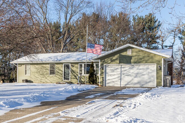 Mid-century ranch-style homes line the streets of suburban Goshen.