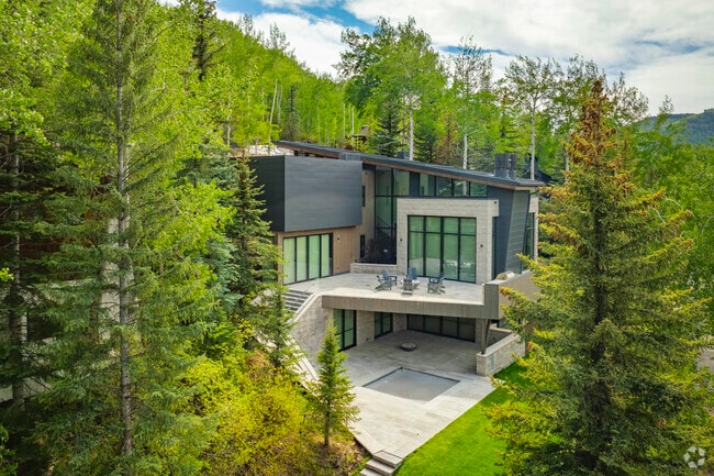 Large homes in Vail, Colorado offer space to breathe and room to grow, often set on forested lots or overlooking Gore Creek, with designs that reflect both the grandeur and intimacy of mountain living.