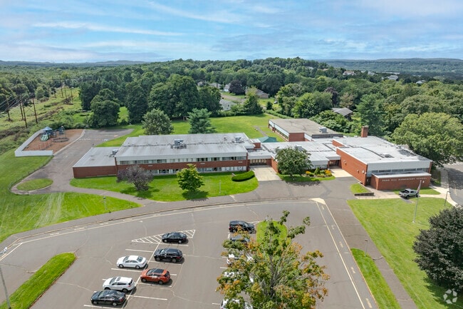 Pond Hill Elementary School is located at 299 Pond Hill Road in Wallingford, CT.