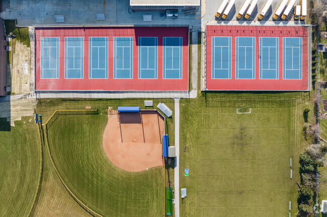 James B Conant High School features many sports courts including tennis and baseball.