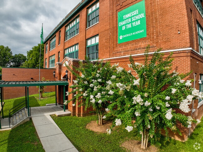 Emerald Academy has flowers near the entrance.