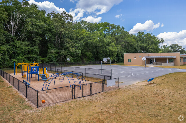 Lake Shore Elementary School playground and outdoor basketball court.