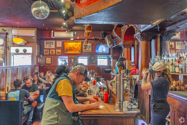 At Hattie's Hat, one of Ballard's oldest restaurants, drinks are made by friendly bartenders.